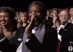 Morgan Freeman clapping at an awards show