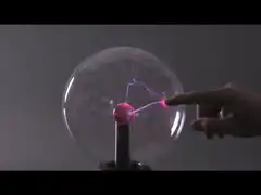 hand touching plasma ball