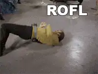 Man in yellow shirt falling over laughing ROFL