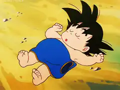 Baby Goku sleeping on the ground