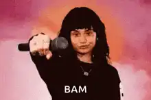 Woman pointing and saying BAM