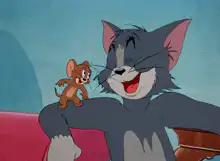 Tom laughs as Jerry runs away