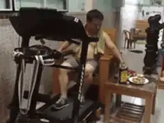 Man eating on a vibrating machine