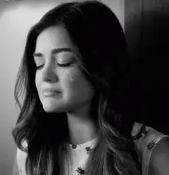 Lucy Hale crying black and white