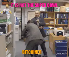 Dwight throws football at Jim