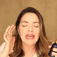 Woman holding serum says it's blowing her mind