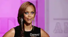 Tyra Banks Damn! Caption