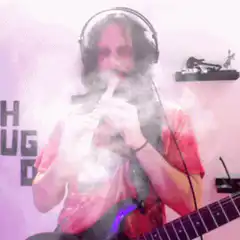 Man playing recorder with smoke beard