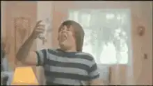 man chugs milk and spills it on face