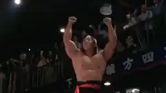 Bull Nakano raises arms in victory