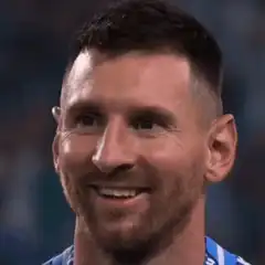 Lionel Messi smiling and laughing