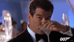 Pierce Brosnan drinks martini