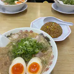 Bowl of ramen with soft boiled eggs and green onions