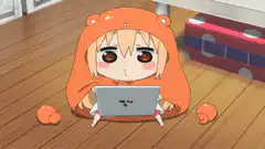 Chi wearing bear onesie with laptop