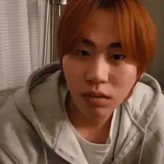 Eunseok from CIX looking down