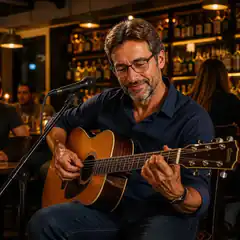Man playing acoustic guitar in bar