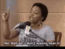 Woman says nah ah i don't wanna hear it