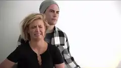 Woman grimacing in disgust