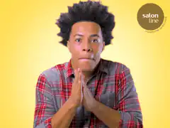 Man with afro praying hands
