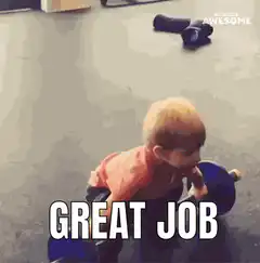 Toddler lifting barbell great job