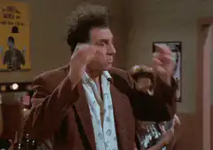 Michael Richards as Cosmo Kramer doing the brain explosion gesture