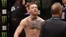 Conor McGregor taunting gesture in octagon