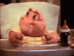 Baby Kermit the Frog eating