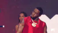 Sean Diddy Combs dancing with a woman