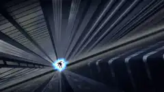 Superhero flying through tunnel with energy blast