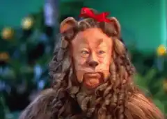 Lion King character with red bow