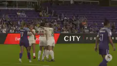 Women's soccer team celebrates goal