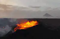Volcano erupting lava flow