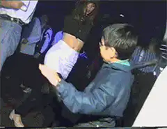 Kid dancing at a club