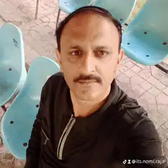 Man sitting on blue chairs