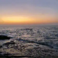 Ocean waves at sunset