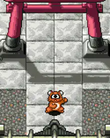 Pixel bear hanging from rope
