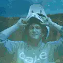 Guy puts on helmet and eyes glow green