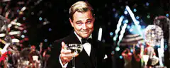 Leonardo DiCaprio toasting with champagne