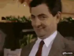 Mr. Bean smirking then shocked