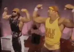 Hulk Hogan and Ultimate Warrior flexing