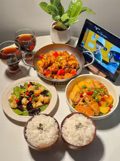 dinner spread with chicken and rice