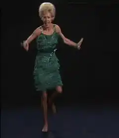 Barbara Eden dancing in green dress