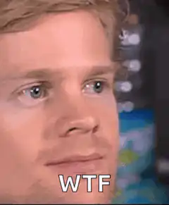 Man blinking with WTF text
