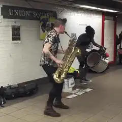 Saxophone and drum buskers at Union Square