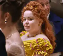 Hermione Granger winks and smiles