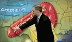 Weatherman pointing at afternoon t-storms