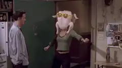 Monica with a chicken on her head