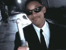 Will Smith Agent J with exploding baton