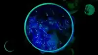 Glowing planet with swirling blue and green energy