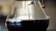 Coffee dripping into carafe
